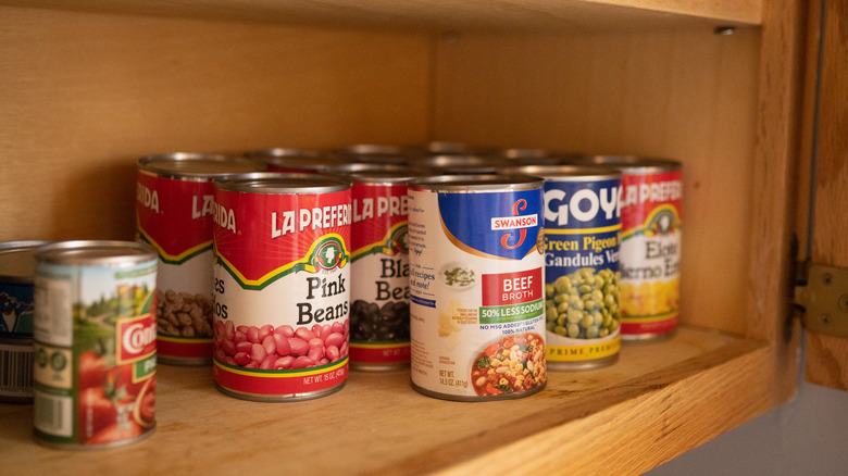 Soup cans in pantry