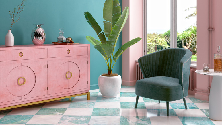 Blue and pink living room with checkered floor.