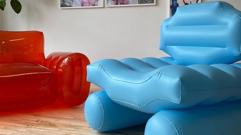Red and blue inflatable arm chairs.