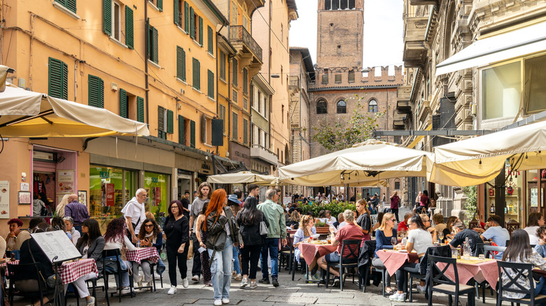 People eating outside in Bologna, Italy