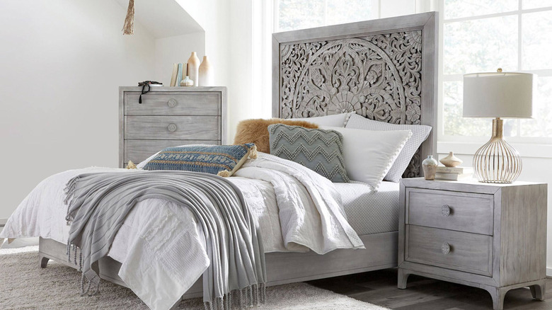 bed set with carved headboard