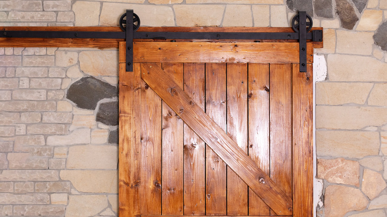 Rustic barn door on interior of home
