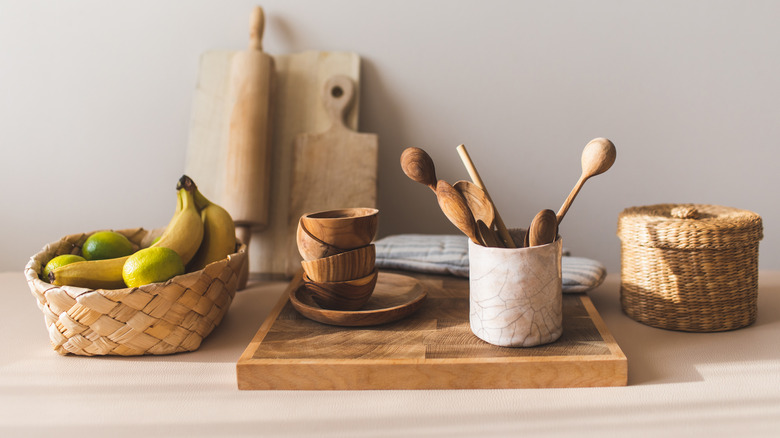 Wood and woven baskets in beige kitchen