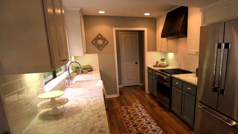 Dark gray cabinets and white uppers