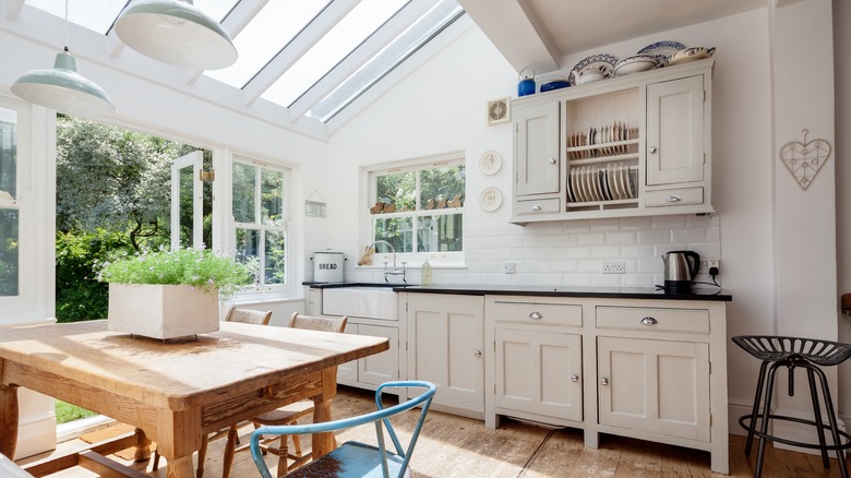 conservatory kitchen with skylights and open French doors