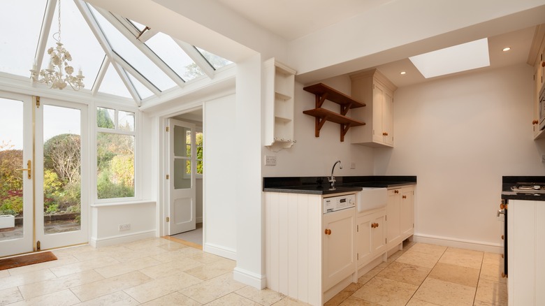 ready to move in kitchen with skylight and conservatory glass