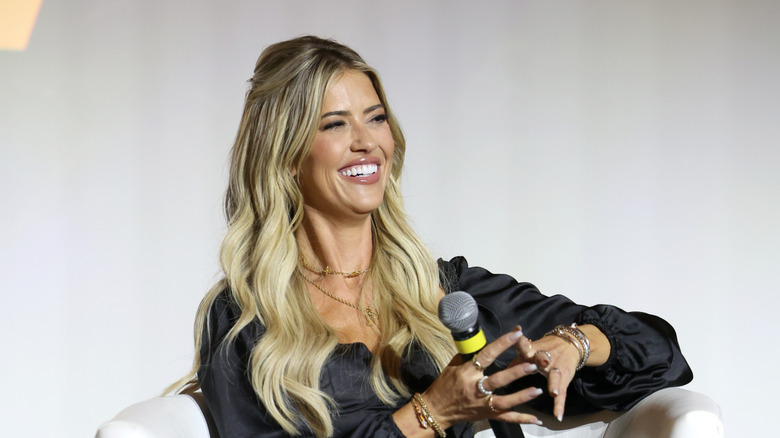 Christina Haack sitting at a panel interview