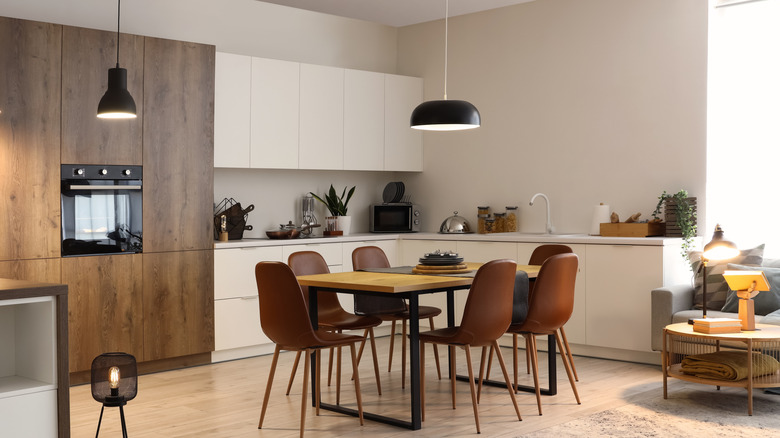 Modern kitchen with a table in the center