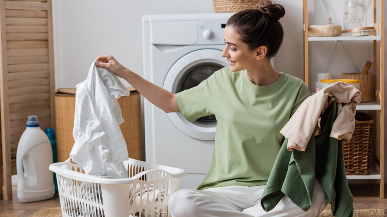 woman sorting laundry
