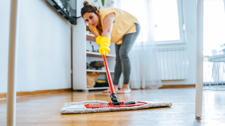 https://www.housedigest.com/img/gallery/the-laundry-room-staple-youll-want-to-use-to-mop-your-floors/intro-1693347694.jpg