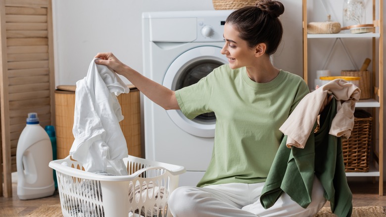 person sorting laundry