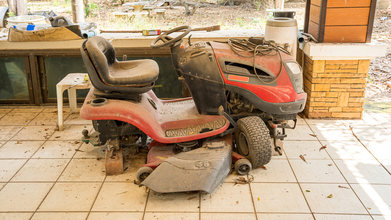 A mower in an advanced state of disrepair