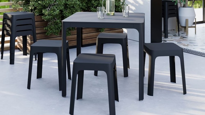Black table with stools