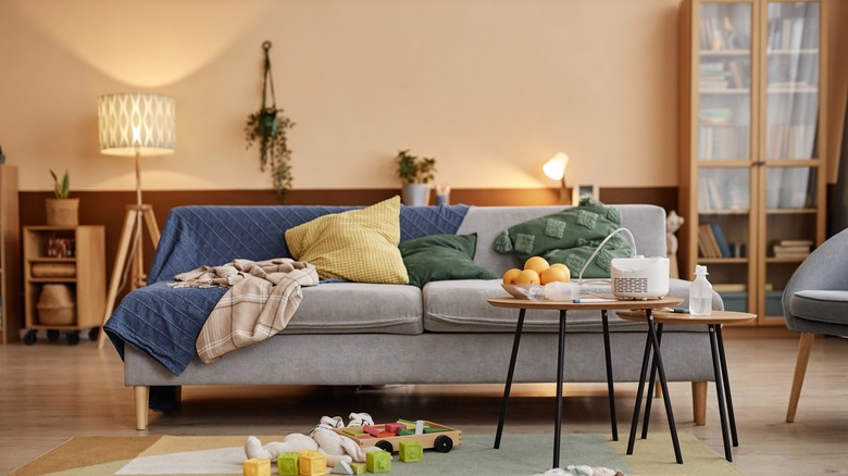Floor and table lamps in neutral room with yellow and green accents