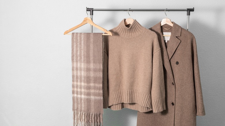 Clothes on a hanger against white background