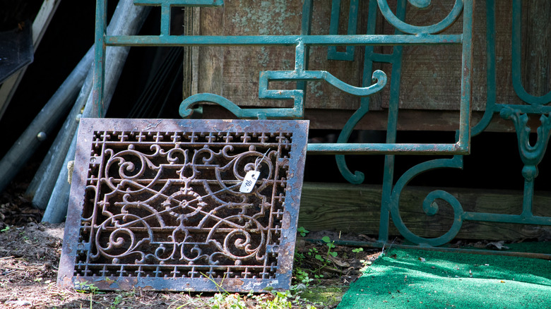 railing and metal grate in salvage yard