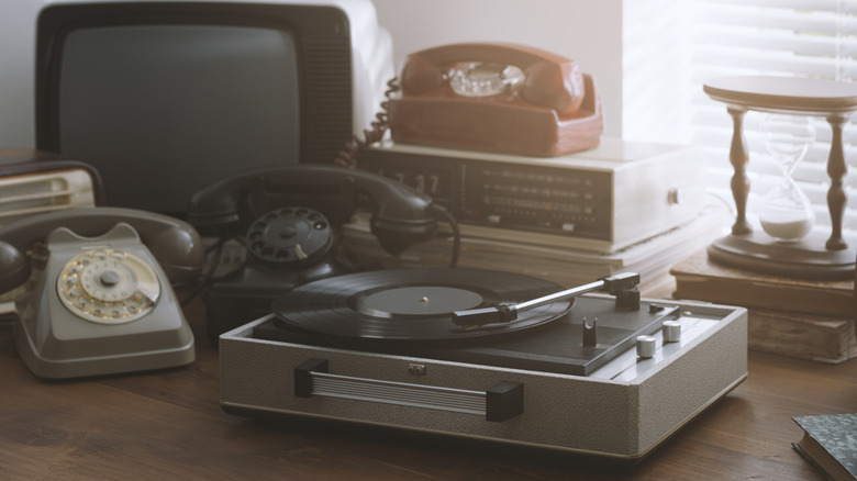Vintage appliances including cameras, phones, and a record player