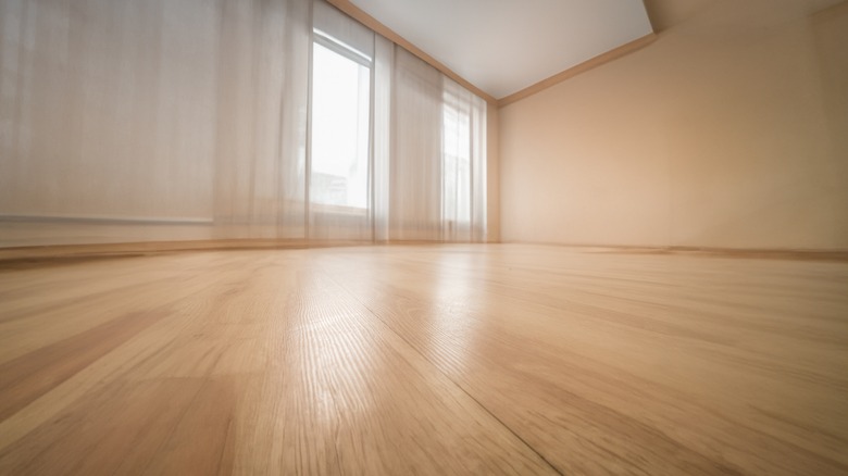 Empty room with hardwood floors