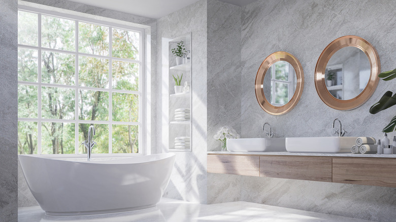 Modern bathroom with large window