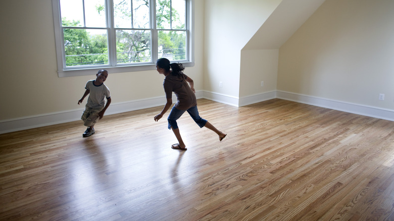 children playing on hardwood floors