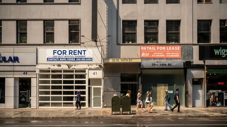 Vacant storefronts in apartment building