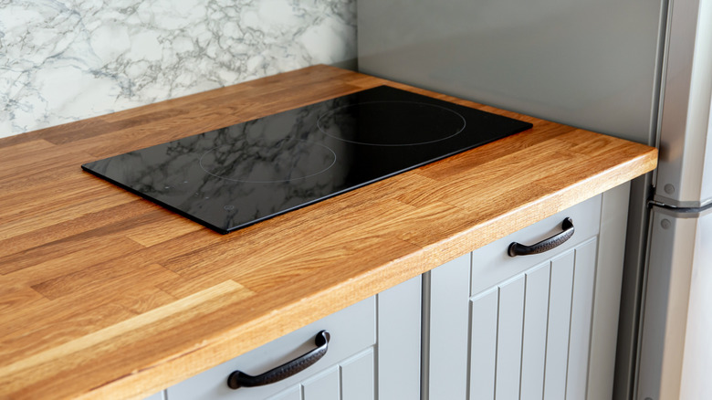 Stylish countertops with natural wood butcher block material