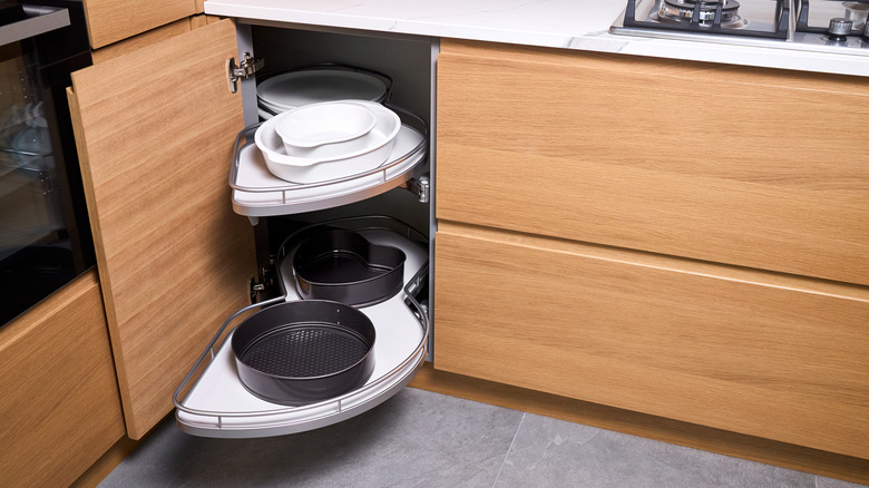 Lazy Susan pull out in corner kitchen cabinet for better access