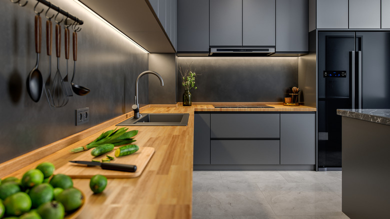 Kitchen with concrete floors and wood countertops