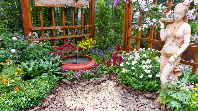 garden with fountain and statue