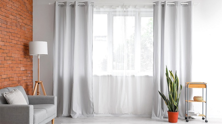 Light gray curtains and walls