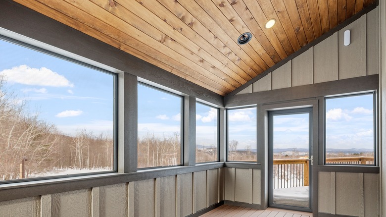 enclosed porch with wood ceiling