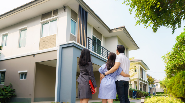 Realtor showing couple a home