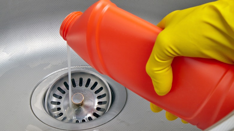 pouring drain cleaner