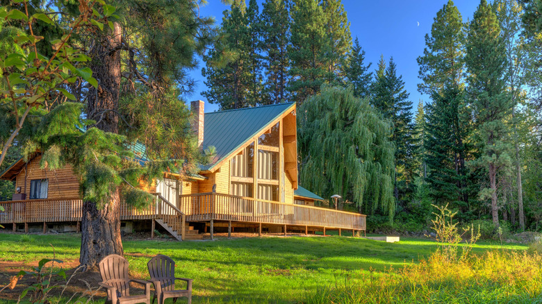 a frame home in greenery