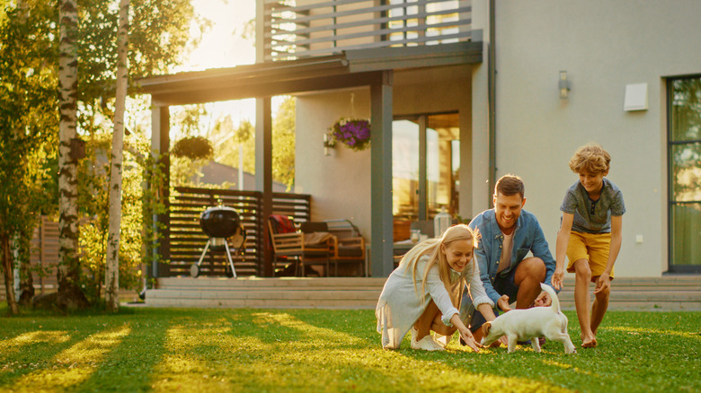 happy family with pet dog