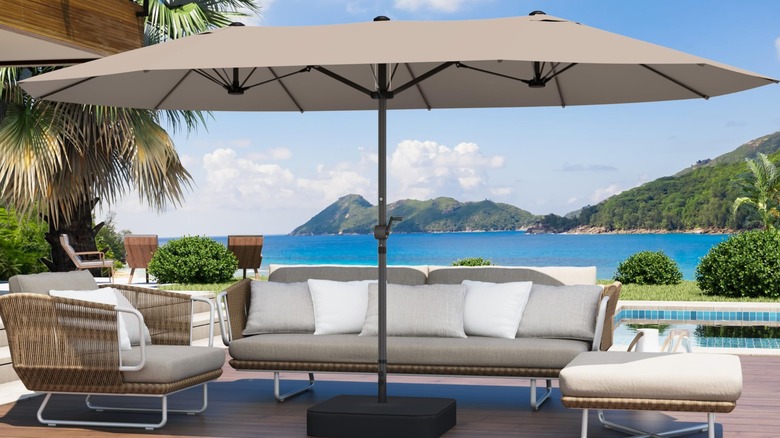 Large patio umbrella high rated for sun shading on patio in backyard