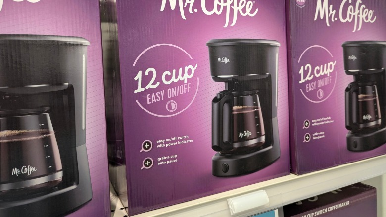 Boxed Mr. Coffee machines on store shelf