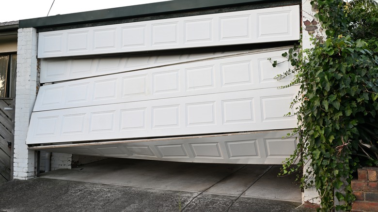 A severely damaged garage door