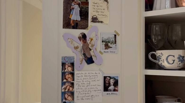 Scrapbook on the hidden side of a kitchen cabinet door.