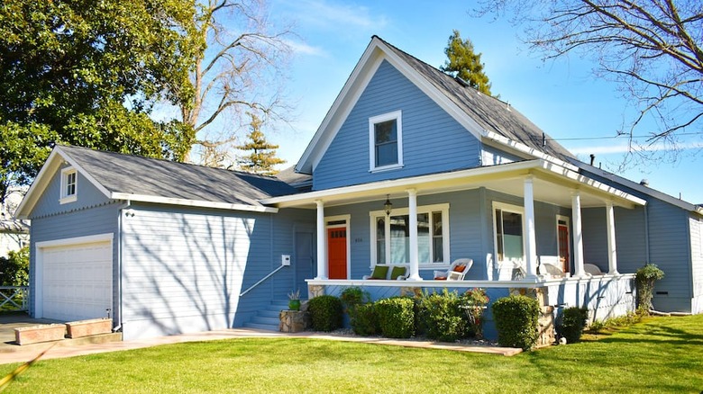 blue house with red door 