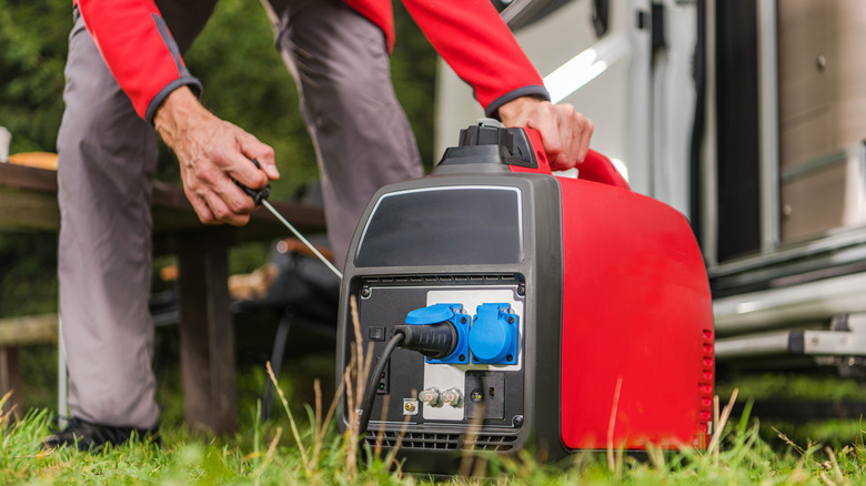 man powers up generator