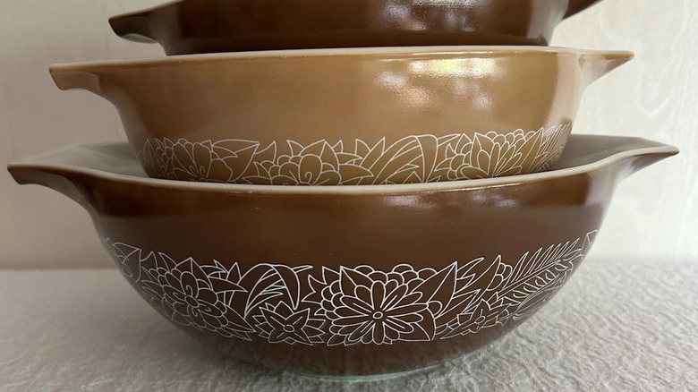 Set of 'Woodland' Pyrex Cinderella bowls, stacked.