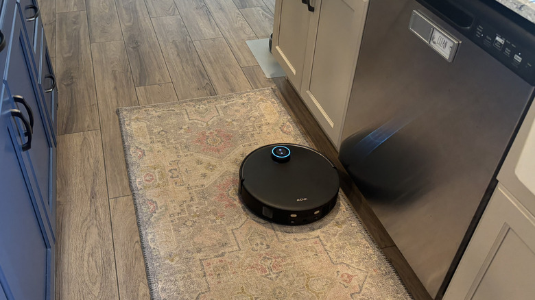 MOVA V50 Ultra Complete vacuuming in kitchen on runner rug