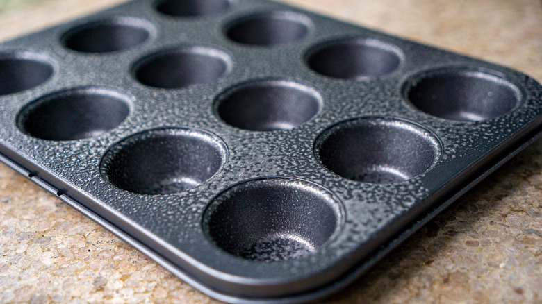 Greased muffin pan