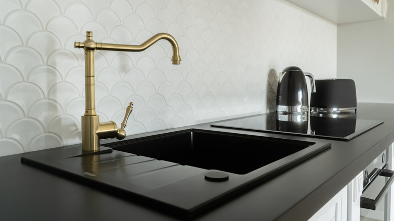 Gold faucet in a kitchen
