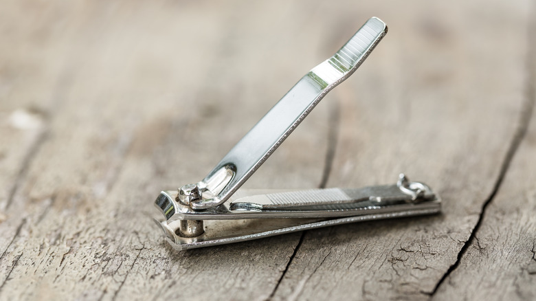Nail clippers on wood surface