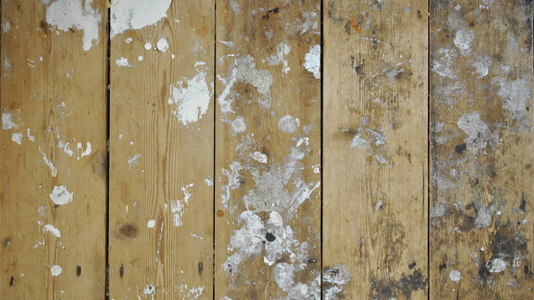 paint-stained wooden surface