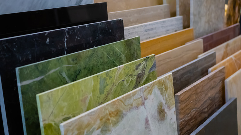 Close-up of various countertop slabs displayed in a store