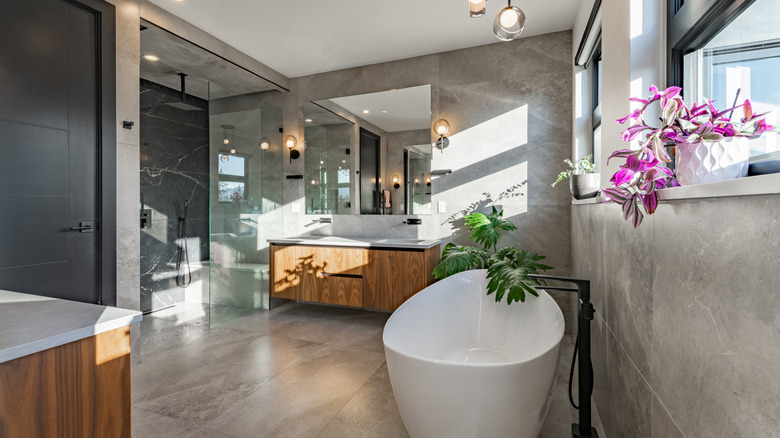 large format stone tiles in a bathroom that create a timeless effect