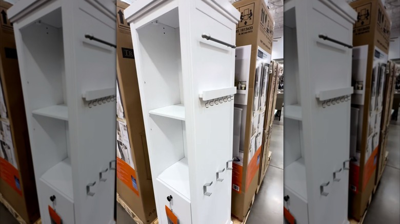 the rotating vanity at costco has deep shelves and hooks for hanging accessories